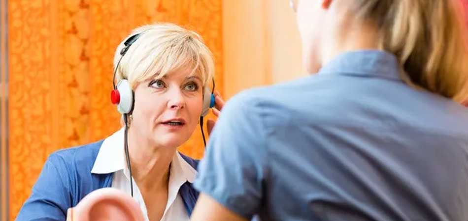 Older Woman Taking Hearing Test