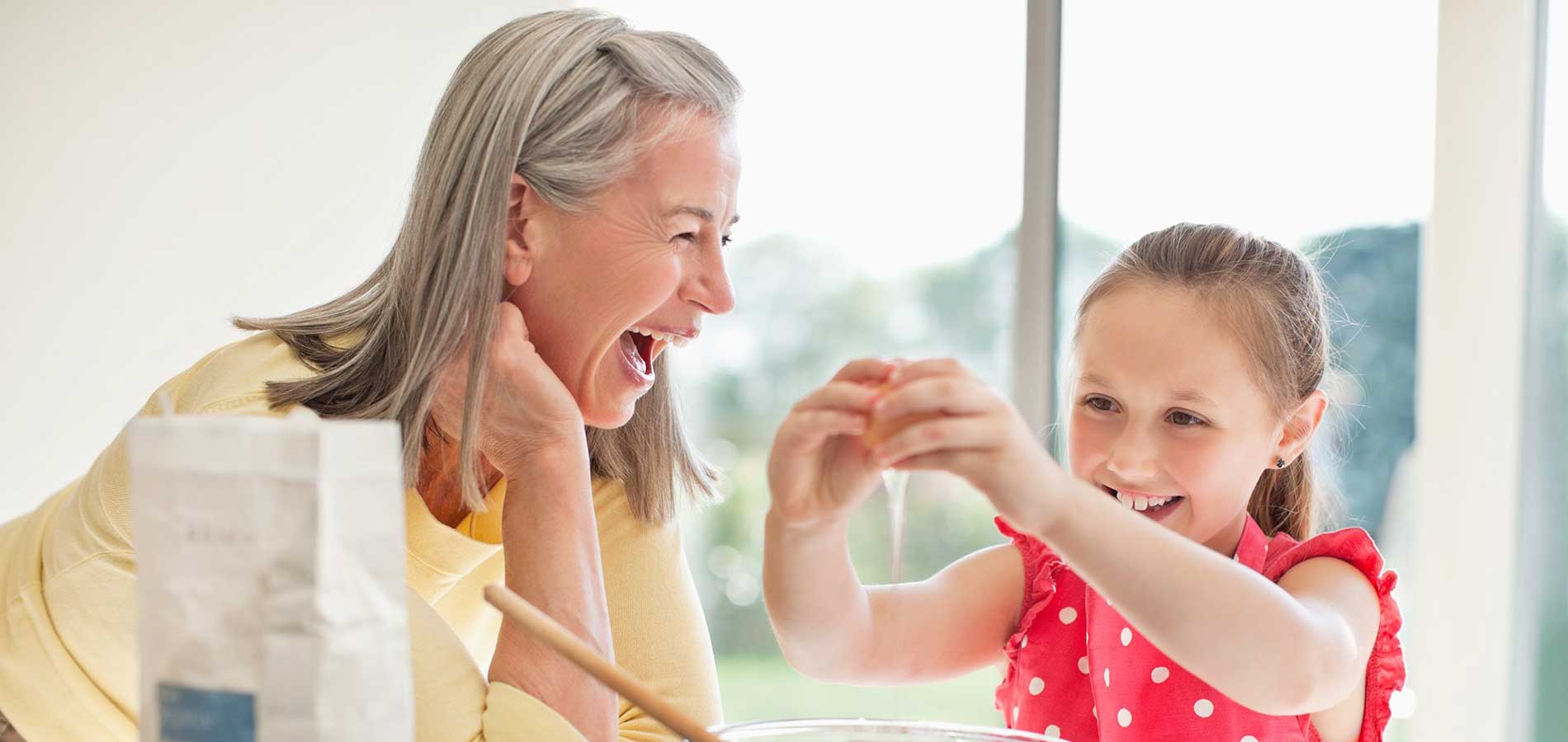 Grandmother Laughing with Granddaughter