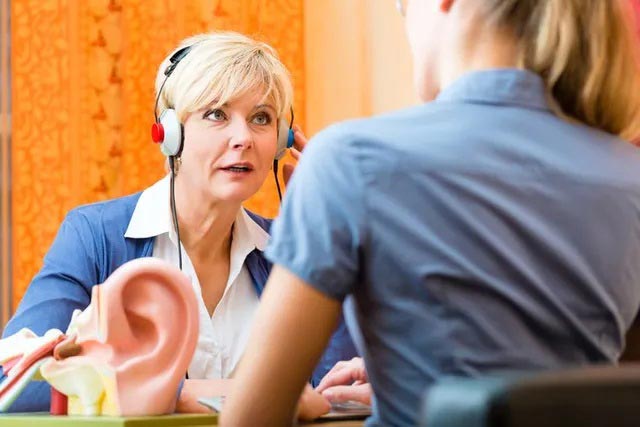 Older Woman Taking Hearing Test